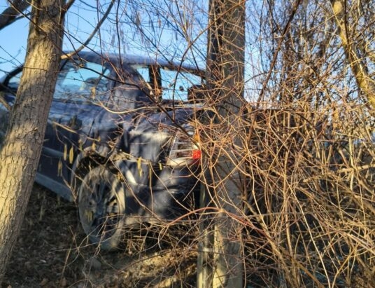 Opel, promile, latarnia i słup